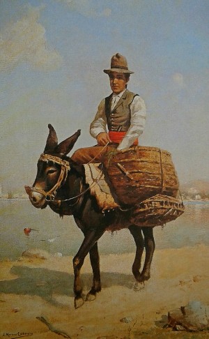 A man riding a donkey